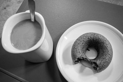 High angle view of coffee cup on table