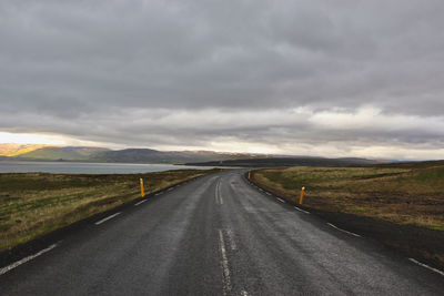 Empty road against sky