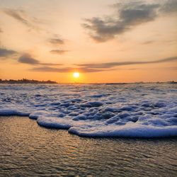 Scenic view of sea against sky during sunset
