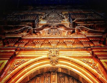 Low angle view of ornate ceiling of building