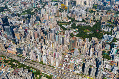 High angle view of crowd on street amidst buildings