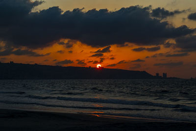 Scenic view of sea against sky during sunset