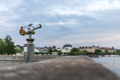 Tourist telescopes, observation binoculars overlooking the zurich lake, shallow depth of field