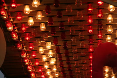 Lit candles in the dark