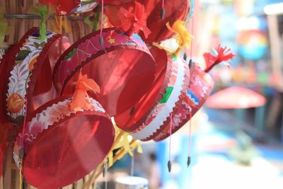 Close-up of artificial red flower for sale in market