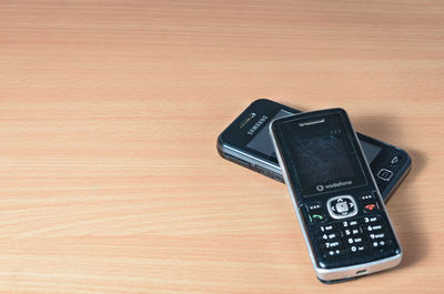 High angle view of smart phone on table