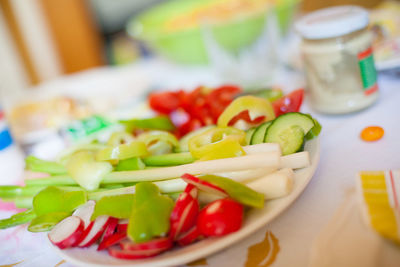 Close-up of chopped vegetables in plate on table