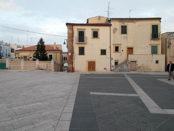 Street in city against sky