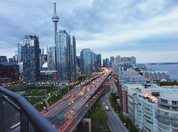 High angle view of street amidst buildings against sky