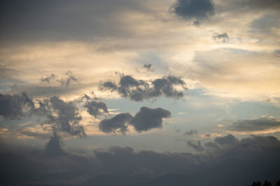 Low angle view of dramatic sky during sunset