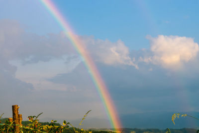 Low angle view of rainbow against sky