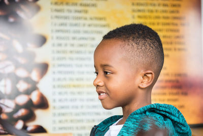 Close-up portrait of boy smiling