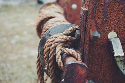 Close-up of rope tied on metal