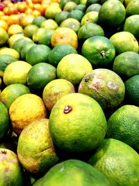 Full frame shot of oranges for sale at market