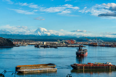 Mount rainier towers over the port of tacoma in washington state.