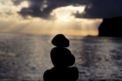 Silhouette of man at sunset