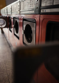 Row of washing machines in a laundromat