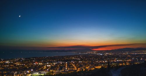 Aerial view of illuminated cityscape