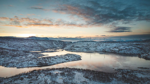 Sunset over  norwegian mountain landscape in finnmark region of northern norway, above arctic circle