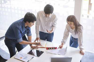 Group of people working on table