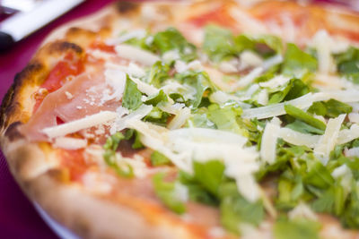 Close-up of pizza in plate on table