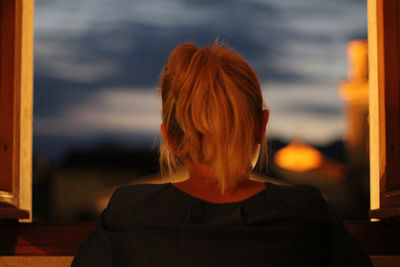 Rear view of senior woman in front
