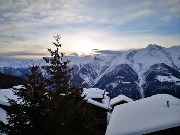 Scenic view of snowcapped mountains against sky