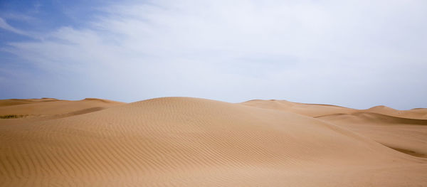 Scenic view of desert against sky