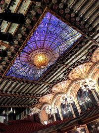 Low angle view of illuminated ceiling of building