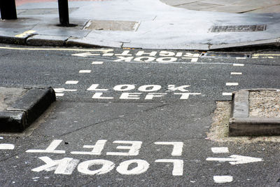 High angle view of text on road