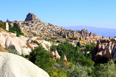 Panoramic view of rock formations against sky