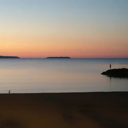 Scenic view of sunset over sea