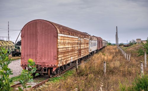 Train on railroad track against sky