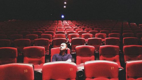 Man sitting in theatre