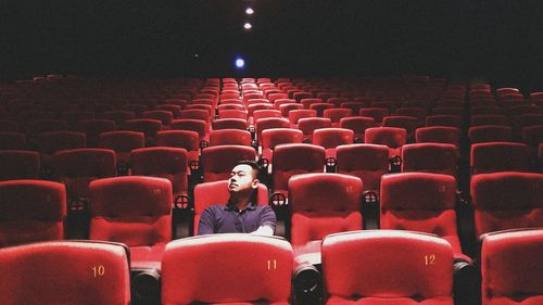 Man sitting in theatre