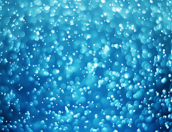 Full frame shot of wet balloons