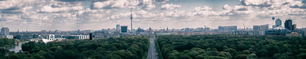 Panoramic view of cityscape against sky