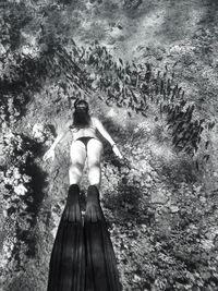 Rear view of woman standing outdoors