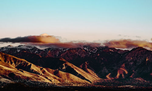 Scenic view of mountains against sky during sunset