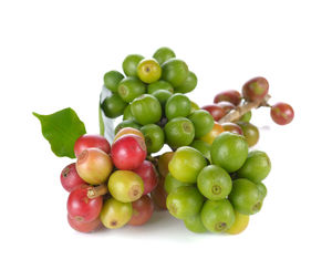 High angle view of grapes over white background