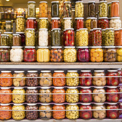 Close-up of preservative food in jars for sale