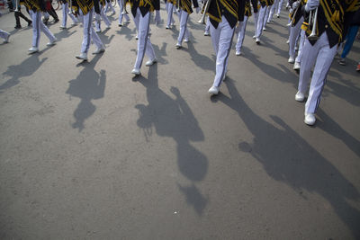 Low section of marching band on street