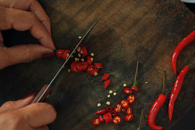 High angle view of person preparing food on table