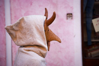 Close-up of horse statue against wall