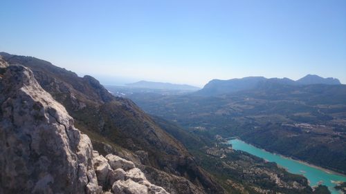 Scenic view of rocky mountains against clear sky