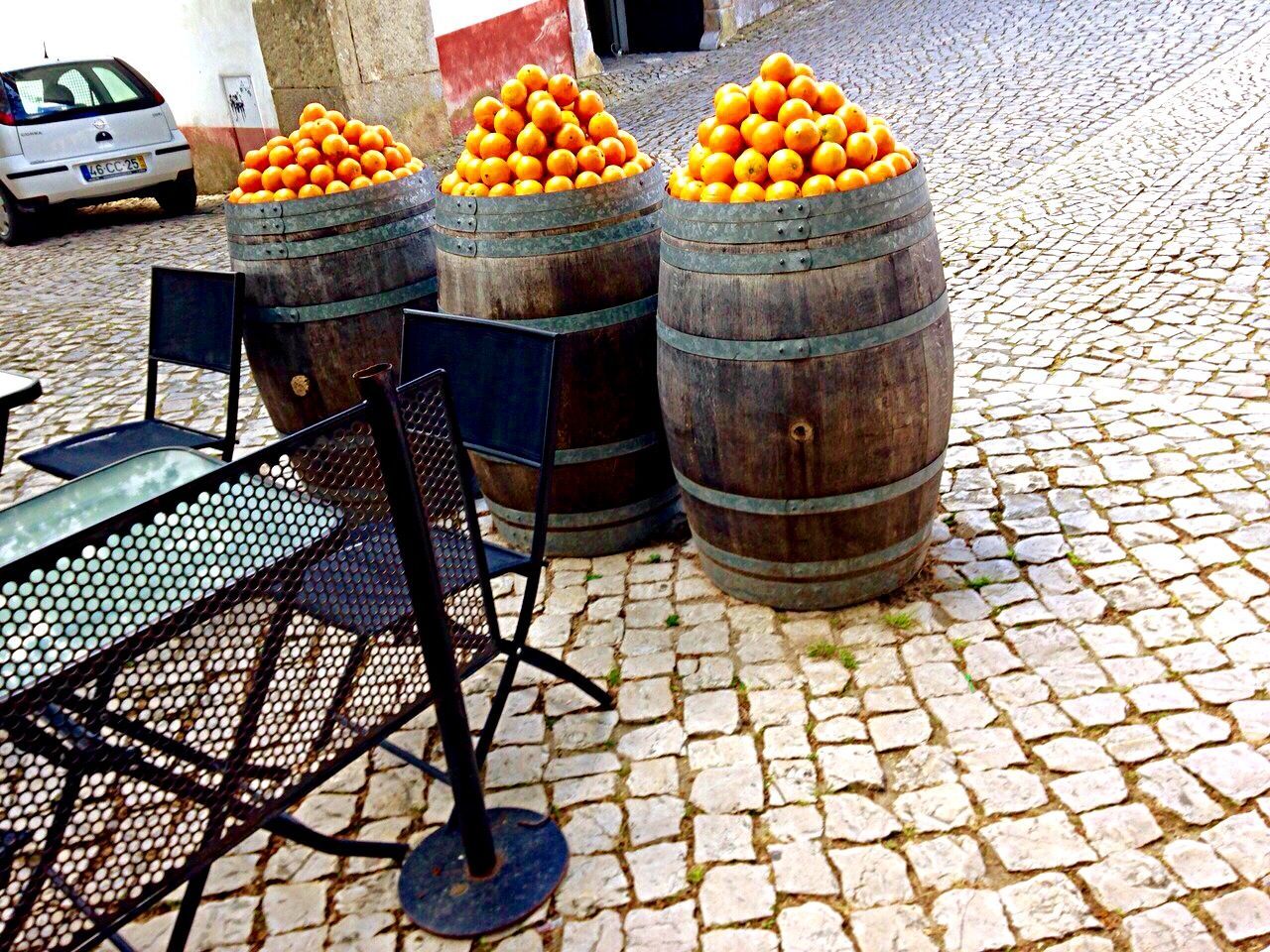 food and drink, food, large group of objects, abundance, high angle view, for sale, freshness, retail, variation, arrangement, cobblestone, basket, still life, healthy eating, day, stack, choice, outdoors, fruit, in a row