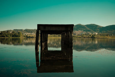 Reflection of mountain in lake against sky