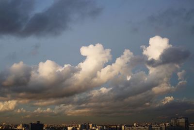 Scenic view of cloudy sky over city