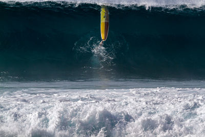 Man surfing in sea