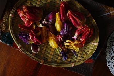 Directly above shot of dried flowers in basket on table